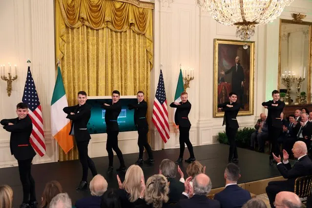 Cairde, an Irish dance group perform on a stage for U.S. President Joe Biden and first lady Jill Biden and other guests including lawmakers, family and representatives of the Irish government as they celebrate St. Patrick's Day at the White House in Washington, U.S., March 17, 2022. (Photo by Leah Millis/Reuters)