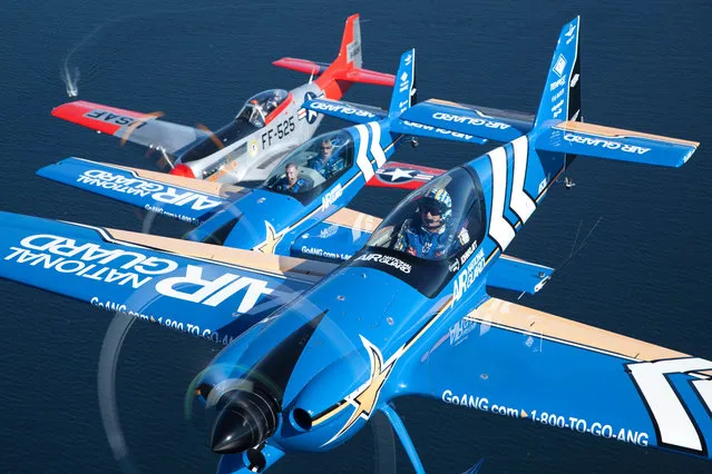 Air National Guard flies with Heritage Flight Museum's historic P-51 Mustang at Seafair 2015 on Thurs., July 30, 2015 in Seattle, Wash. (Photo by Matt Mills McKnight/Invision for John Klatt Airshows, Inc./AP Images)