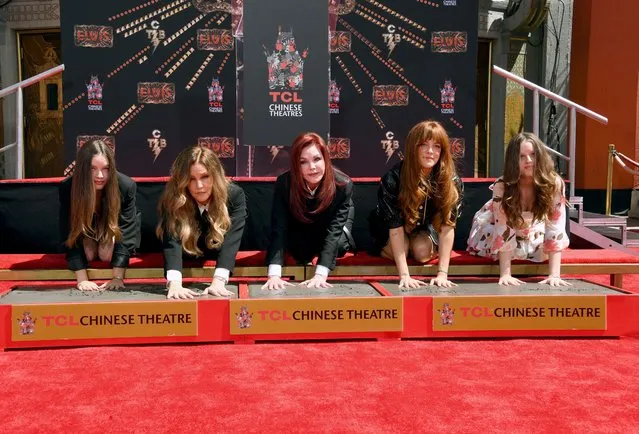 (L-R) Harper Vivienne Ann Lockwood, Lisa Marie Presley, Priscilla Presley, Riley Keough, and Finley Aaron Love Lockwood attend the Handprint Ceremony honoring Three Generations of Presley's at TCL Chinese Theatre on June 21, 2022 in Hollywood, California. (Photo by Axelle/Bauer-Griffin/FilmMagic)