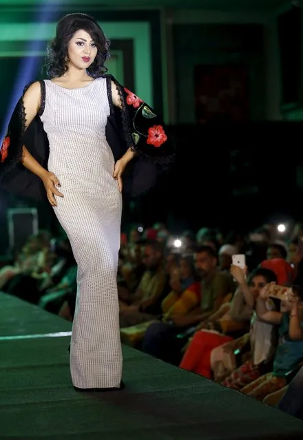 A model presents a creation by Iraqi designer Waffa Al-Shathar during a fashion show at the Hunting Club in Baghdad August 13, 2015. (Photo by Thaier al-Sudani/Reuters)