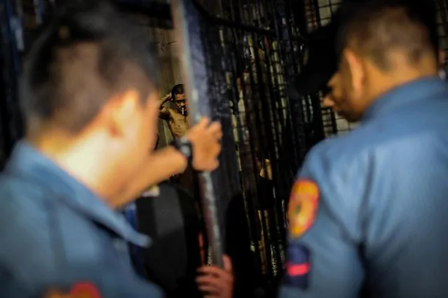 Drug suspects are led into a crowded jail cell, June 20, 2016, in Manila, Philippines. (Photo by Dondi Tawatao/Getty Images)