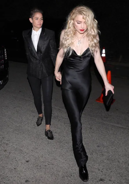 Amber Heard is seen arriving with her new girlfriend at the Oscars WME party in Los Angeles on February 7, 2020. Her date was very protective as she stopped a moving SUV. (Photo by The Mega Agency)