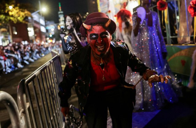 A person wearing a costume takes part in the annual NYC Halloween Parade in New York City on October 31, 2024. (Photo by Jeenah Moon/Reuters)