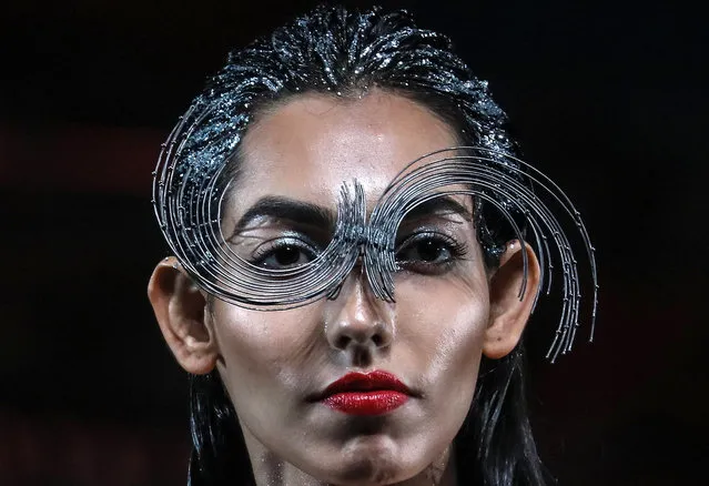 A model presents a creation by Indian designer Amit Aggarwal during the grand finale of the Lakme Fashion Week (LFW) Summer/Resort 2020 in​ Mumbai, India, 16 February 2020. (Photo by Divyakant Solanki/EPA/EFE)