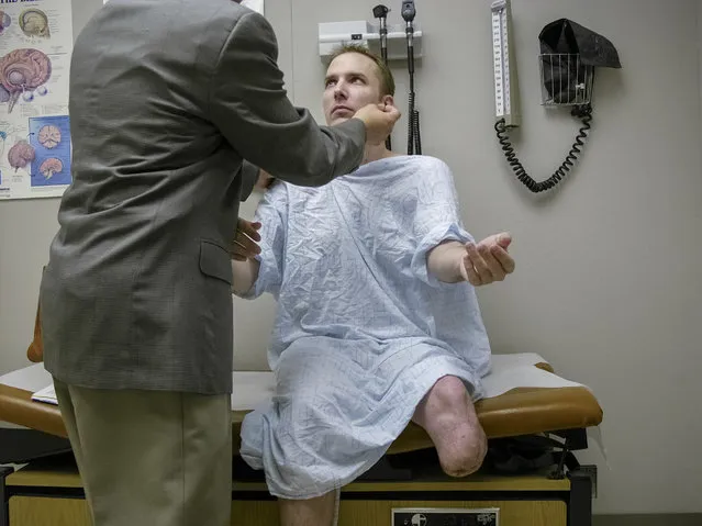 Hubbard at a medical appointment to determine the benefits he would receive for his injuries in 2008. (Photo and caption by Van Agtmael/Harrison Jacobs/Magnum Photos)