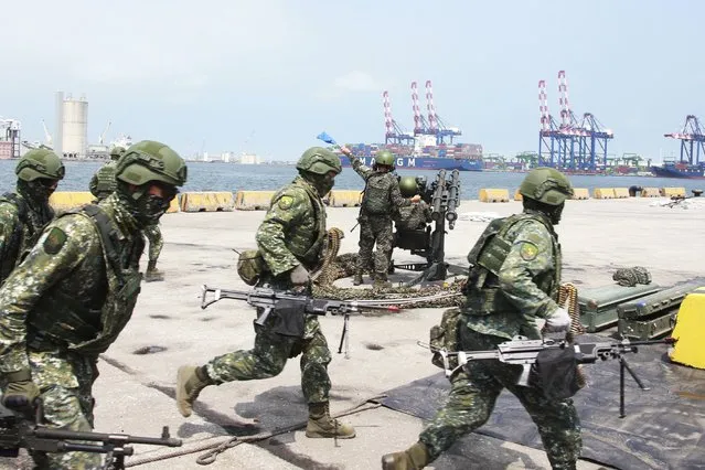 In this photo released by the Taiwan Ministry of National Defense, Taiwan military forces conduct anti-landing drills during the annual Han Kuang military exercises near New Taipei City in Taiwan on Wednesday, July 27, 2022. (Photo by Taiwan Ministry of National Defense via AP Photo)