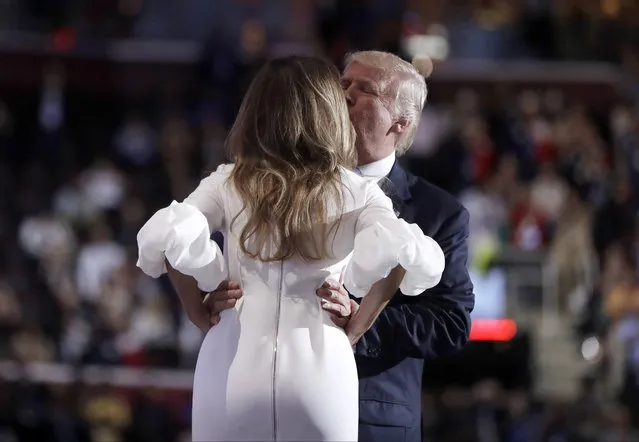 Republican Presidential Candidate Donald Trump kisses his wife Melania Trump as he introduces her during first day of the Republican National Convention in Cleveland, Monday, July 18, 2016. (Photo by Matt Rourke/AP Photo)