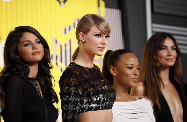 From left, recording artists Selena Gomez and Taylor Swift, actress Serayah McNeill and model Lily Aldridge arrive at the 2015 MTV Video Music Awards in Los Angeles, California, August 30, 2015. (Photo by Danny Moloshok/Reuters)