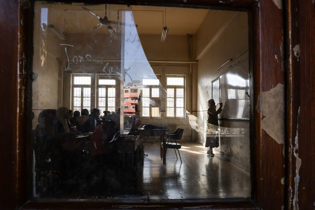 Students sit in a classroom at a school following an announcement of the reopening of schools by the authorities, after Syria's Bashar al-Assad was ousted, in Damascus, Syria, on December 19, 2024. (Photo by Amr Abdallah Dalsh/Reuters)