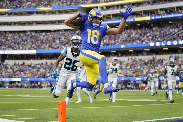 Los Angeles Rams wide receiver Ben Skowronek (18) scores a touchdown pat Carolina Panthers cornerback Keith Taylor Jr. (28) during the second half of an NFL football game Sunday, October 16, 2022, in Inglewood, Calif. (Photo by Ashley Landis/AP Photo)