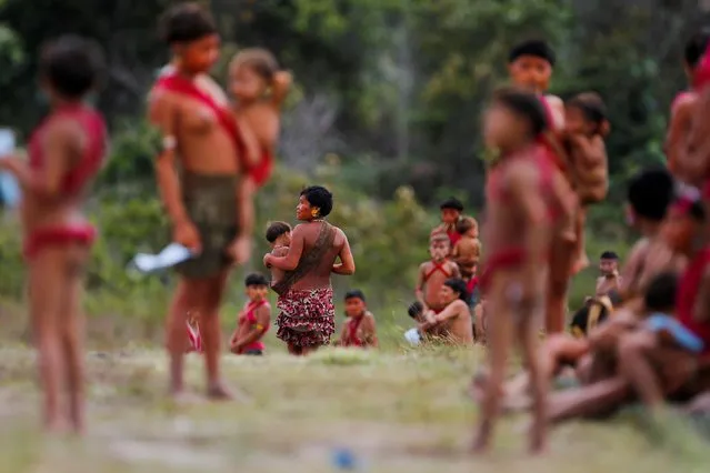 Indigenous from Yanomami ethnic group are seen, amid the spread of the coronavirus disease (COVID-19), at the 4th Surucucu Special Frontier Platoon of the Brazilian army in the municipality of Alto Alegre, state of Roraima, Brazil on July 1, 2020. (Photo by Adriano Machado/Reuters)