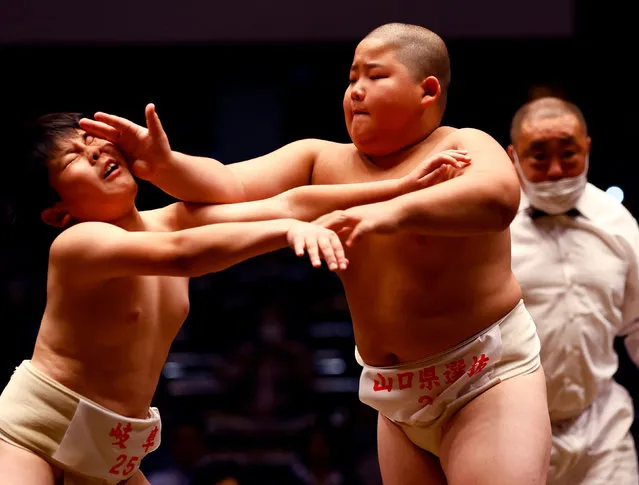 Elementary school sumo wrestlers compete in the sumo ring during the Wanpaku sumo-wrestling tournament in Tokyo, Japan on October 29, 2022. (Photo by Kim Kyung-Hoon/Reuters)
