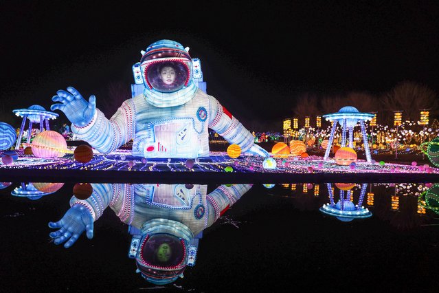 A general view of an astronaut style lantern at Wenyuhe Park in Beijing, China, 23 February 2024. The Lantern Festival is the main traditional festival in China and is celebrated everywhere on the 15th day of the new lunar year calendar when people hang lanterns and festoons and make 'Yuan Xiao', or sweet rice dumplings. (Photo by Wu Hao/EPA/EFE/Rex Features/Shutterstock)
