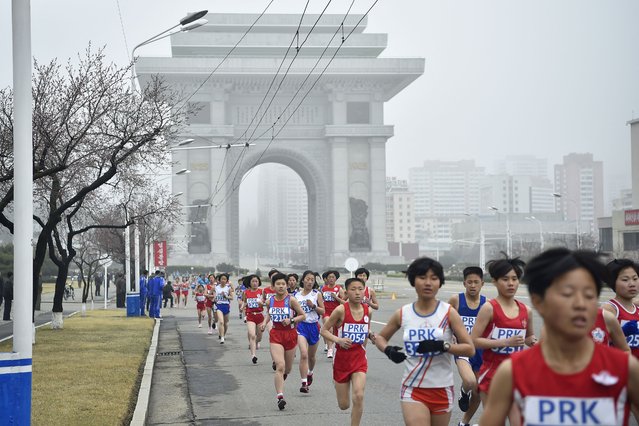 Participants take part in the 31st Pyongyang International Marathon in Pyongyang on April 6, 2025, as part of celebrations marking the birth of North Korea's founding leader Kim Il Sung in 1912. The last edition of the Pyongyang Marathon was held in 2019 before the pandemic, during which the nuclear-armed state sealed its borders in an effort to contain the virus. (Photo by KIM Won Jin/AFP Photo)