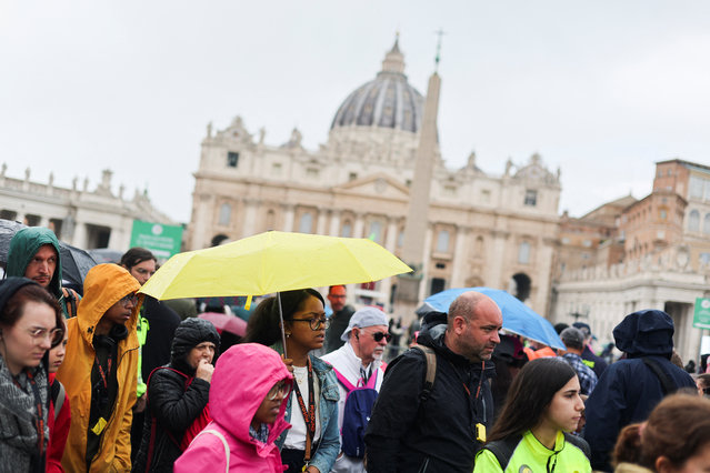 Faithful queue to enter St. Peter's Basilica to pay respect as Pope Francis lies in state, as seen from Rome, Italy, on April 24, 2025. (Photo by Mohammed Salem/Reuters)