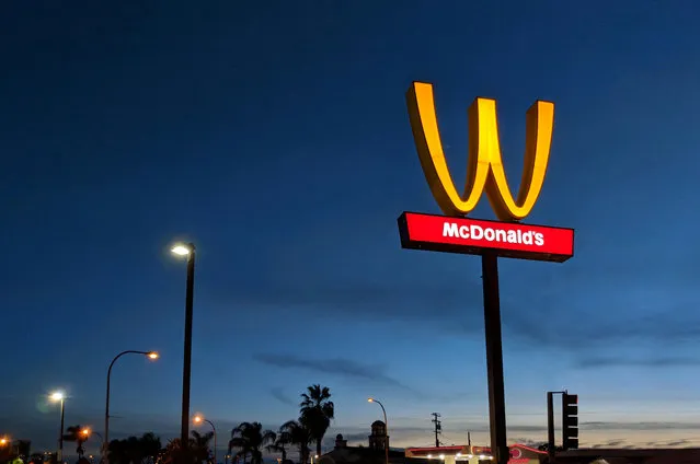 McDonald's «M» logo is turned upside down in honour of International Women's Day in Lynwood, California on March 8, 2018. (Photo by Courtesy McDonald's/Reuters)