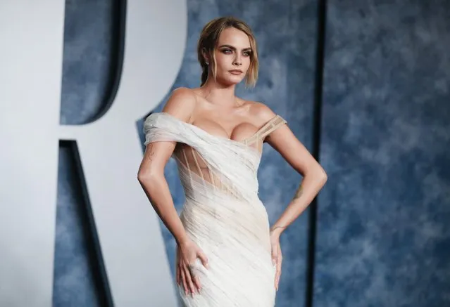 English model and actress Cara Delevingne arrives at the Vanity Fair Oscar party after the 95th Academy Awards, known as the Oscars, in Beverly Hills, California, U.S., March 12, 2023. (Photo by Danny Moloshok/Reuters)