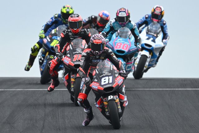 Senna Agius, center, of Australia riding for Liqui Moly Dynavolt Intact GP leads the field during the Moto2 at the Australian Motorcycle Grand Prix at Phillip Island, Australia, Sunday, October 19, 2025. (Photo by Joel Carrett/AAPImage via AP Photo)