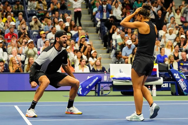 Sara Errani, right, of Italy, and Andrea Vavassori, left, of Italy, react after defeating Iga Swiatek, of Poland, and Casper Ruud, of Norway, in the mixed doubles final at the U.S. Open tennis championships, Wednesday, August 20, 2025, in New York. (Photo by Yuki Iwamura/AP Photo)