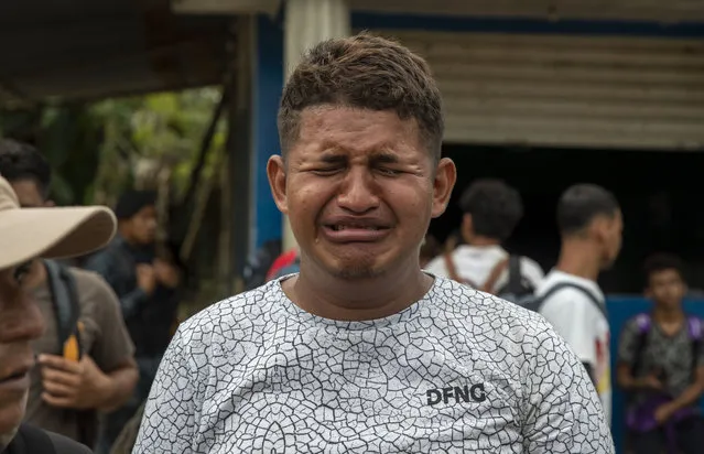 A teenage Honduran migrant traveling in a group of migrants cries as is he deported by Guatemalan police in Morales, Guatemala, Thursday, January 16, 2020. (Photo by Moises Castillo/AP Photo)