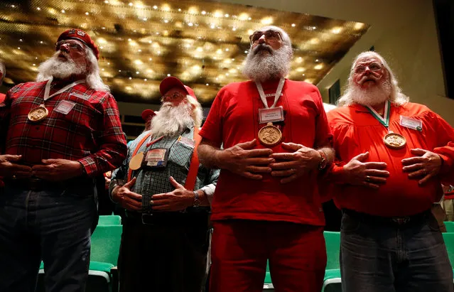 Santas learn breathing techniques as they attend class at the Charles W. Howard Santa Claus School in Midland, Michigan, U.S. October 27, 2016. (Photo by Christinne Muschi/Reuters)