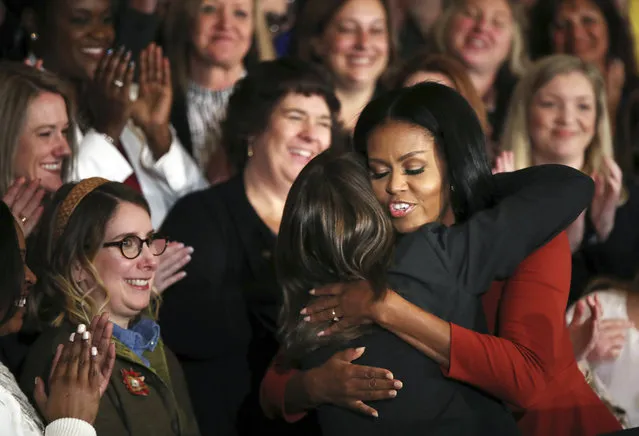 First lady Michelle Obama hugs 2017 School Counselor of the Year Terri Tchorzynski, after her final speech as First Lady at the 2017 School Counselor of the Year ceremony in the East Room of the White House in Washington, Friday, January 6, 2017. (Photo by Manuel Balce Ceneta/AP Photo)