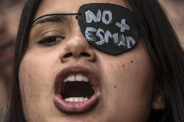 A university student shouts slogans during a demonstration calling for the anti-riot police force to be dismantled, in Medellin, Colombia, on January 17, 2019. (Photo by Joaquín Sarmiento/AFP Photo)