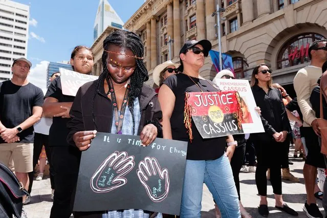 People gather and hold signs during a rally for Cassius Turvey at Forrest Place in Perth, Wednesday, November 2, 2022. Cassius Turvey, 15, was allegedly bashed with a metal pole while walking home from school with friends in Middle Swan in October 2022. (Photo by Richard Wainwright/AAP Image)