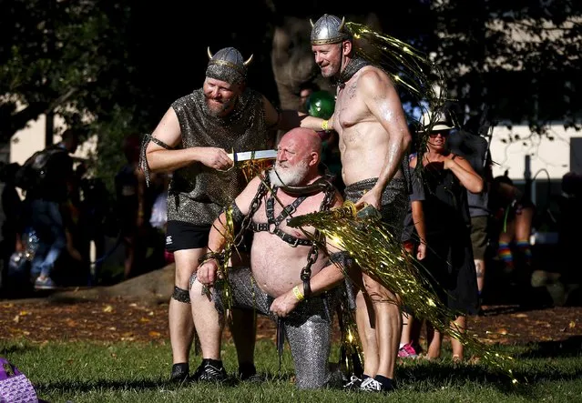 Performers dressed in their costumes prepare to participate in the Gay and Lesbian Mardi Gras parade in Sydney, Australia, March 5, 2016. (Photo by David Gray/Reuters)