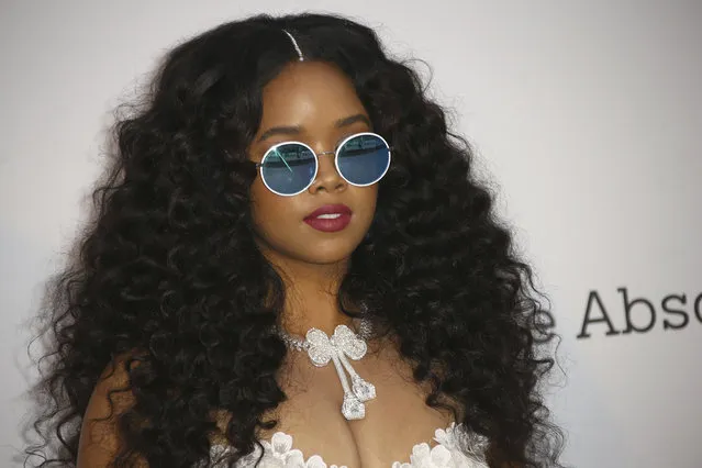 Singer H.E.R. poses for photographers upon arrival at the amfAR, Cinema Against AIDS, benefit at the Hotel du Cap-Eden-Roc, during the 72nd international Cannes film festival, in Cap d'Antibes, southern France, Thursday, May 23, 2019. (Photo by Joel C. Ryan/Invision/AP Photo)
