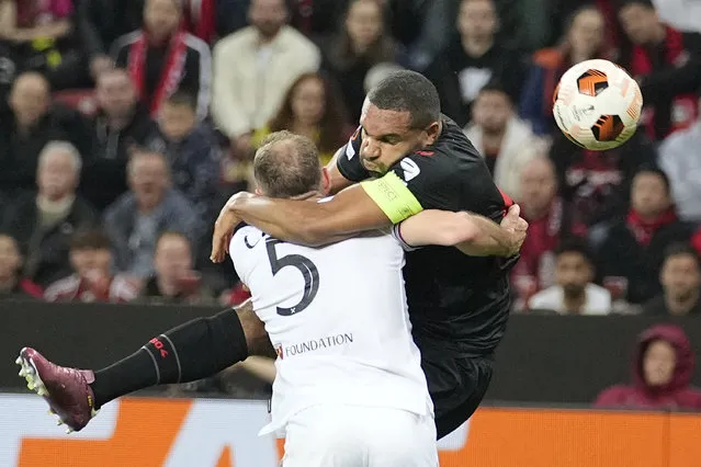 West Ham's Vladimir Coufal, left, and Leverkusen's Jonathan Tah collide as they battle for the ball during the Europa League quarterfinals first-leg soccer match between Bayer 04 Leverkusen and West Ham United at the BayArena in Leverkusen, Germany, Thursday, April 11, 2024. (Photo by Martin Meissner/AP Photo)