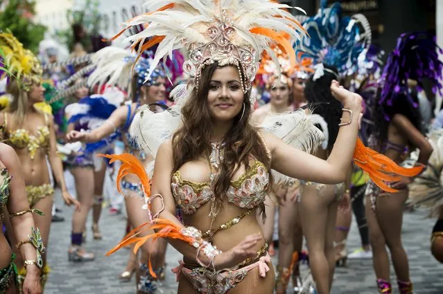 A dancer takes part in the Copenhagen Carnival parade May 23, 2015. (Photo by Jens Astrup/Reuters/Scanpix Denmark)