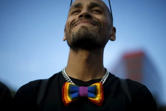 A man smiles at a celebration rally in West Hollywood, California, United States, June 26, 2015. (Photo by Lucy Nicholson/Reuters)