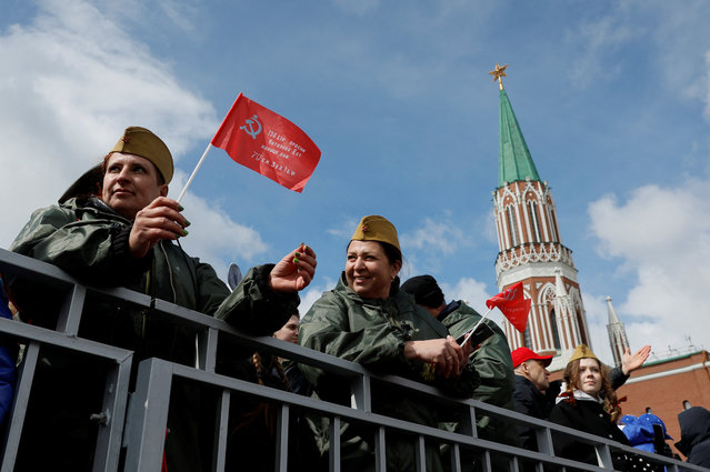 Spectators attend a military parade on Victory Day, which marks the 79th anniversary of the victory over Nazi Germany in World War Two, in Red Square in Moscow, Russia on May 9, 2024. (Photo by Maxim Shemetov/Reuters)