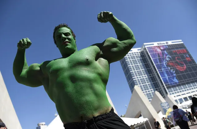 Nicholas DeCapria of Philadelphia, dressed as the Hulk, collects donations for his son Vhito DeCapria, who is battling pediatric cancer, on day 2 of Comic-Con International on Friday, July 10, 2015, in San Diego, Calif. (Photo by Chris Pizzello/Invision/AP Photo)