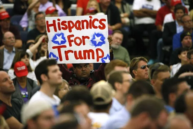 A supporter holds a sign as Republican U.S. presidential candidate Donald Trump holds a rally in Anaheim, California, U.S. May 25, 2016. (Photo by Jonathan Ernst/Reuters)