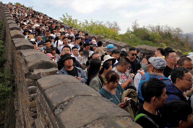 People visit the Mutianyu section of the Great Wall during the five-day Labour Day holiday in Beijing, China on April 30, 2023. (Photo by lorence Lo/Reuters)