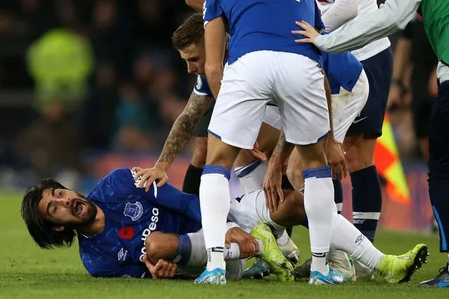 Andre Gomes of Everton reacts after being tackled by Son Heung-Min of Tottenham Hotspur during the Premier League match between Everton FC and Tottenham Hotspur at Goodison Park on November 03, 2019 in Liverpool, United Kingdom. (Photo by Jan Kruger/Getty Images)