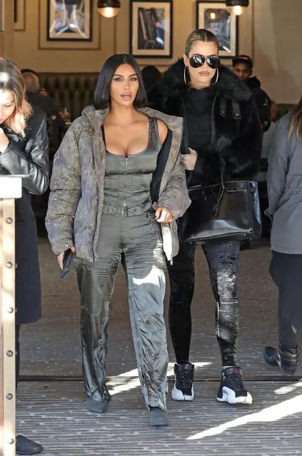 Kim Kardashain wears a green military pilot inspired outfit while Khloe wears all black outfit with a black fur coat as they meet for lunch while filming KUWTK in Los Angeles on December 2, 2019. (Photo by Splash News and Pictures)