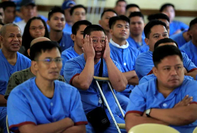 Wounded soldiers from war-torn Marawi who fought against the Maute group watch the box fight between Manny Pacquiao of the Philippines and Australia's Jeff Horn during the WBO World Welterweight Title, at the multi-purpose hall of the army hospital at Fort Bonifacio in Taguig City, Metro Manila, Philippines July 2, 2017. (Photo by Romeo Ranoco/Reuters)