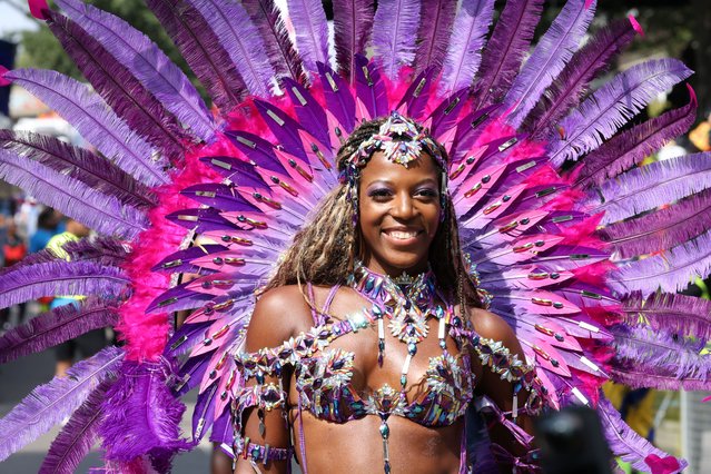 A samba dancer takes part in the Notting Hill Carnival, in London, Britain on August 26, 2024. (Photo by Mina Kim/Reuters)