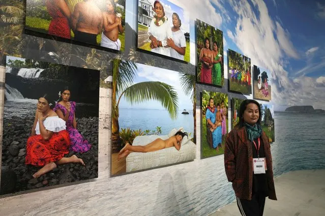 Artist Yuki Kihara poses next to installation “Paradise Camp” at New Zealand's pavilion during the 59th Biennale of Arts exhibition in Venice, Italy, Tuesday, April 19, 2022. (Photo by Antonio Calanni/AP Photo)
