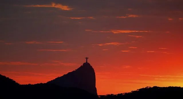 Jesus Christ the Redeemer during sunrise in Rio de Janeiro, Brazil, August 2, 2016. (Photo by Kai Pfaffenbach/Reuters)
