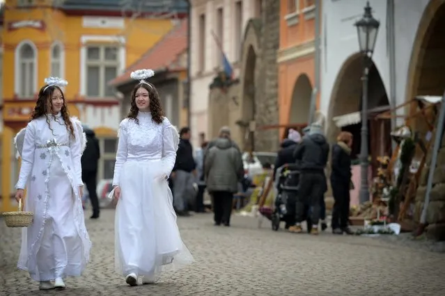 Journey of the angels during Advent 2021 on the Square in Ustek in the Czech Republic on December 18, 2021. People dressed as angels walking during Festival of Angels at Ustek. Festival was modified due to the Corona virus pandemic and current restrictions in the Czech Republic. (Photo by Slavek Ruta/Rex Features/Shutterstock)