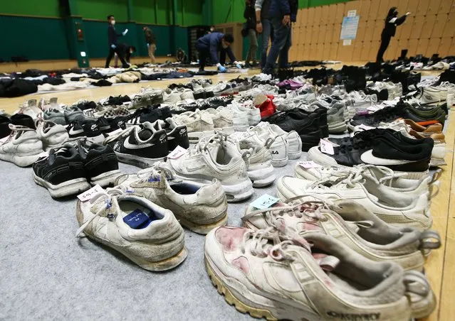 Shoes collected from the scene of an stampede, at a multi-purpose gym in Seoul, South Korea, 01 November 2022. According to the National Fire Agency, at least 154 people were killed and 149 were injured in the stampede on 29 October as a large crowd came to celebrate Halloween. (Photo by Jeon Heon-Kyun/EPA/EFE/Rex Features/Shutterstock)