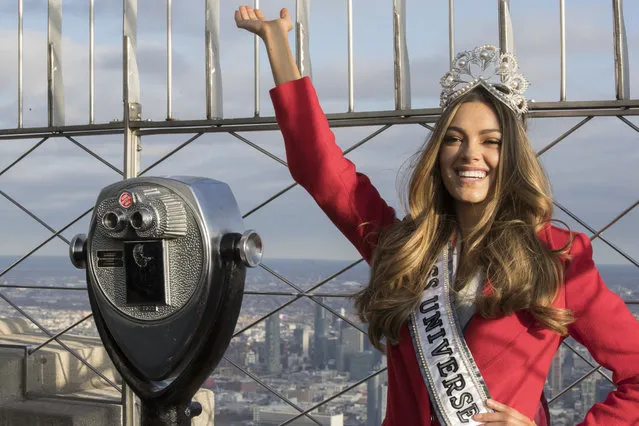 Miss Universe 2017 Demi-Leigh Nel-Peters, of South Africa, poses for photographers on the 86th Floor Observation Deck of the Empire State Building, Tuesday, November 28, 2017, in New York. (Photo by Mary Altaffer/AP Photo)