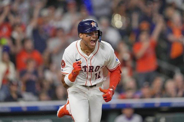 Houston Astros' Cam Smith (11) reacts after hitting a single on his first Major League at-bat during the second inning of an opening-day baseball game against the New York Mets Thursday, March 27, 2025, in Houston. (Photo by David J. Phillip/AP Photo)