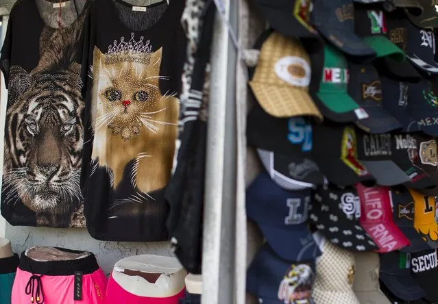One of many clothing shops displays its merchandise in the border town of San Ysidro, California September 2, 2015. (Photo by Mike Blake/Reuters)