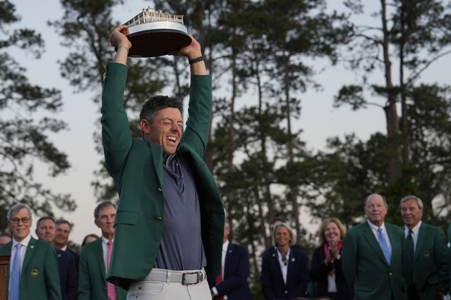 Winner Rory McIlroy, of Northern Ireland, holds the trophy at the Masters golf tournament, Sunday, April 13, 2025, in Augusta, Ga. (Photo by David J. Phillip/AP Photo)