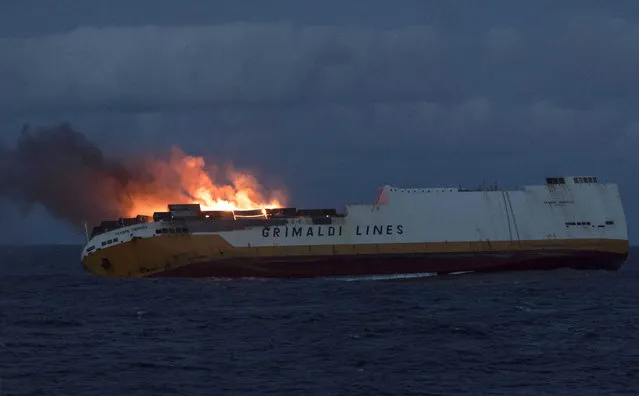 This photo provided on Thursday March 14, 2019 by the Marine Nationale, shows the Grimaldi vessel Grande America on fire in the Bay of Biscay, off the west coast of France, Monday March 11, 2019. French authorities are working to contain an oil spill off the Atlantic Coast after the Italian tanker sank following a fire. French and British rescue teams saved all 27 people aboard the Grande America tanker after it sank Tuesday. (Photo by Loic Bernardin/Marine Nationale via AP Photo)